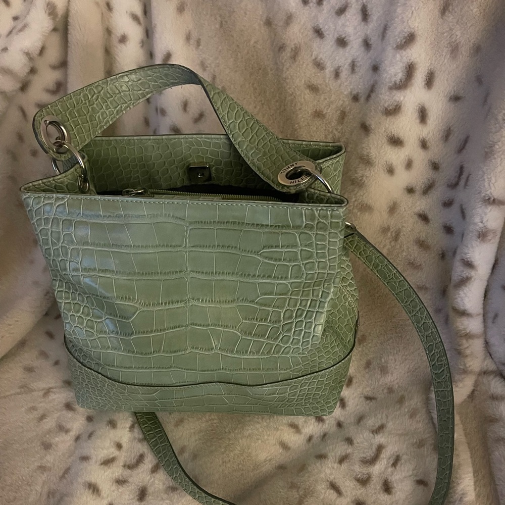 Green Tommy Hilfiger crossbody purse.